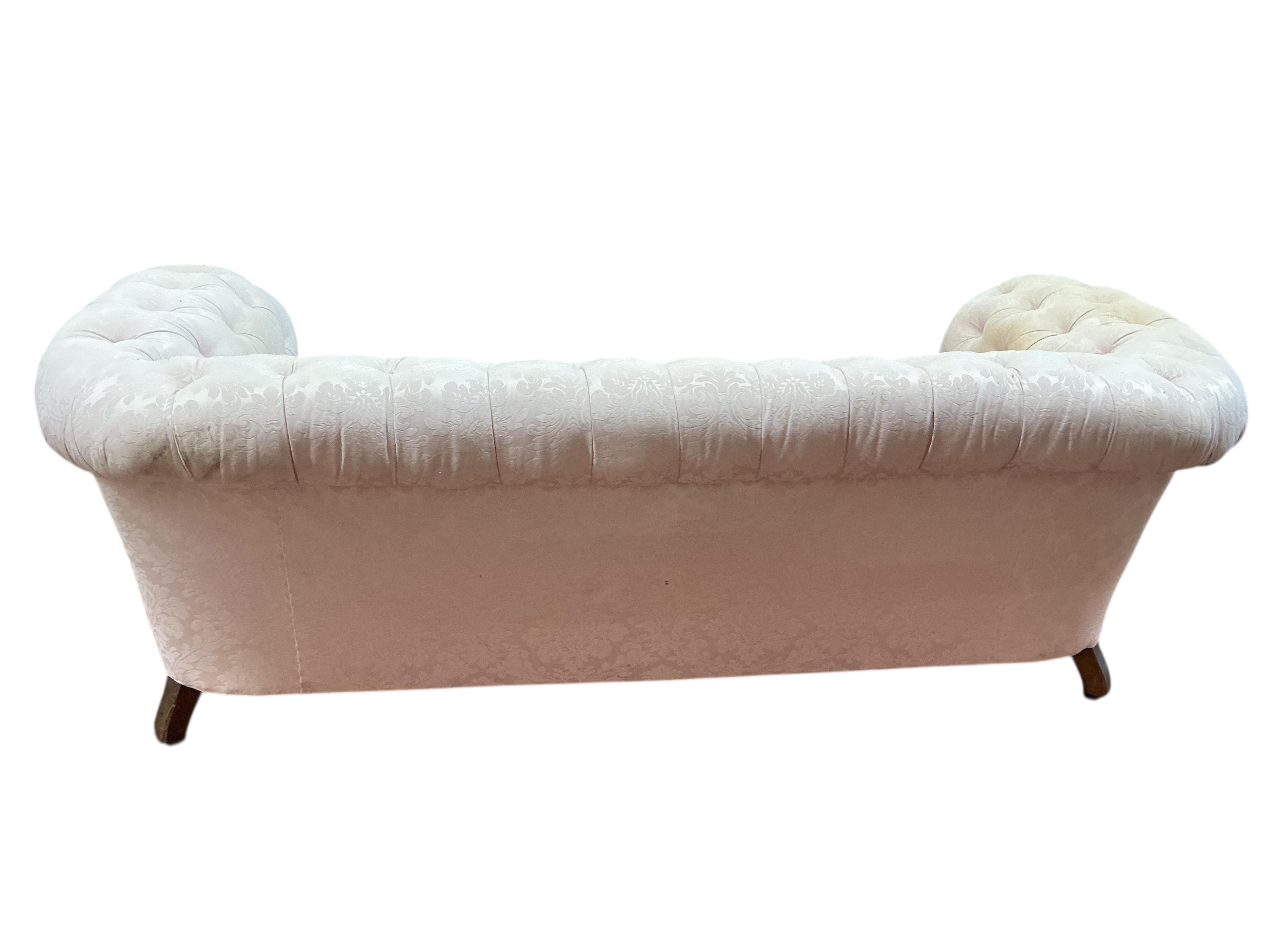 A Victorian deep buttoned Chesterfield settee, width 236cm, depth 91cm, height 84cm